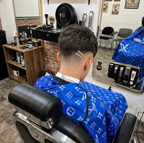 Back view getting haircut